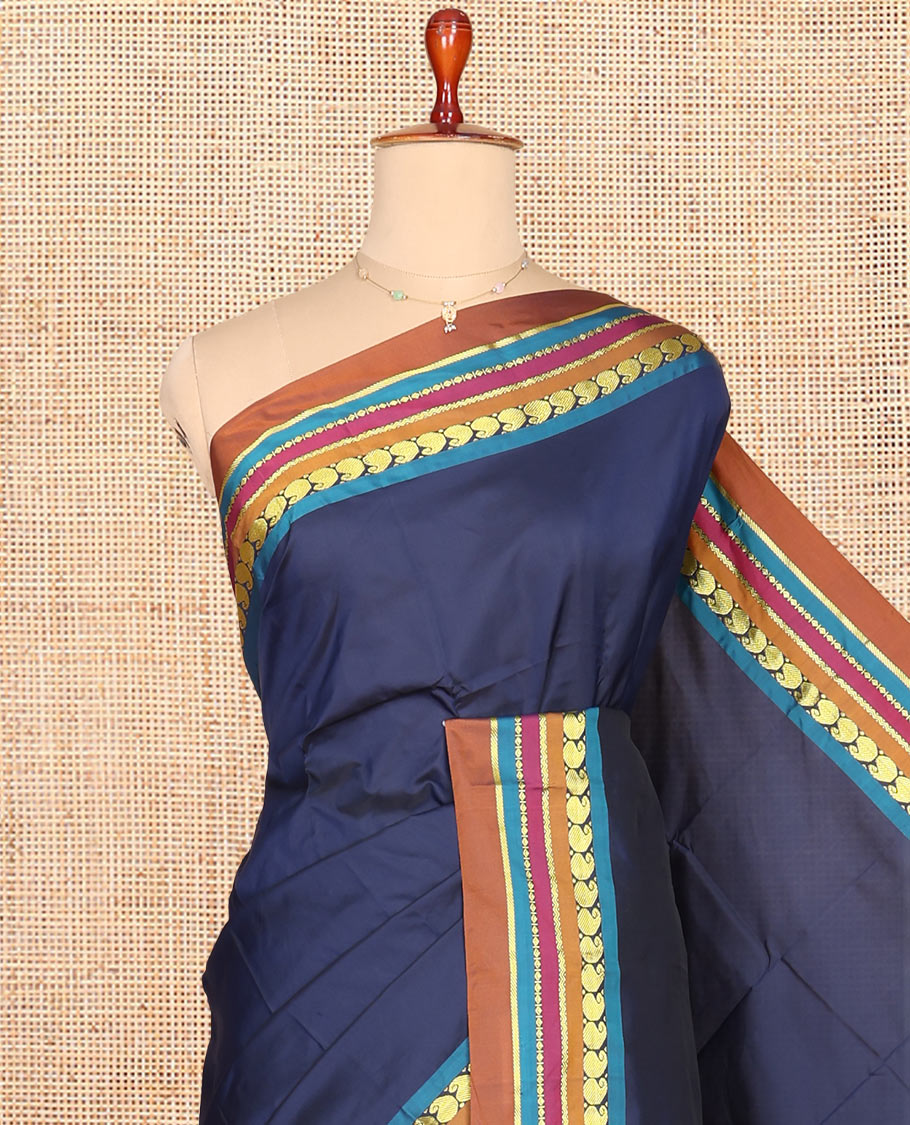 Navy Blue Plain Aarani Gift Saree, Complemented by a Contrast Traditional Design Temple Border, Captivating Contrast Pallu of Stripes, and Paired with a Contrast Blouse