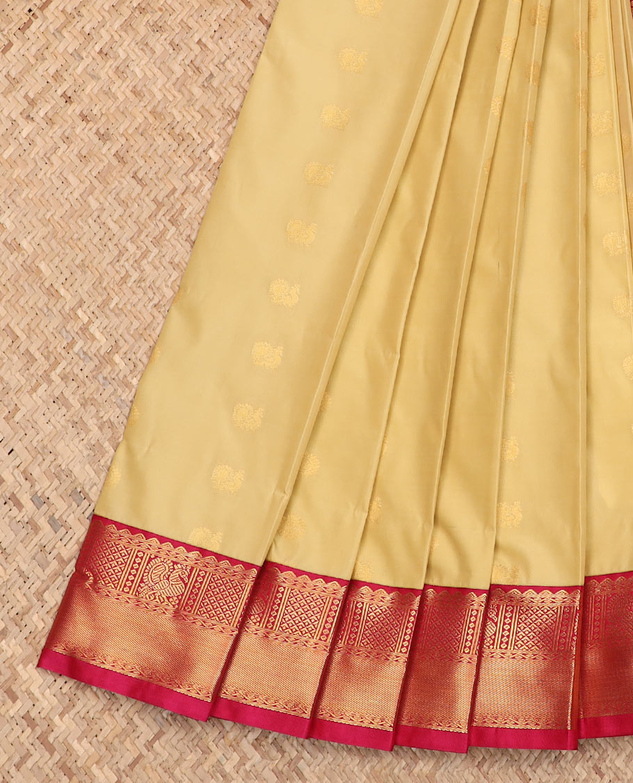 Yellow zari buttas budget silk saree, contrast traditional zari border, and pallu of jaal design