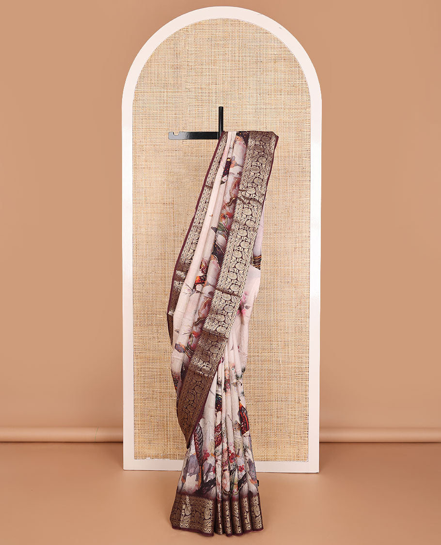 Pale pink nature-theme printed with French knot embroidered dola silk saree, contrast floral zari design border & French knot thread embroidered pallu