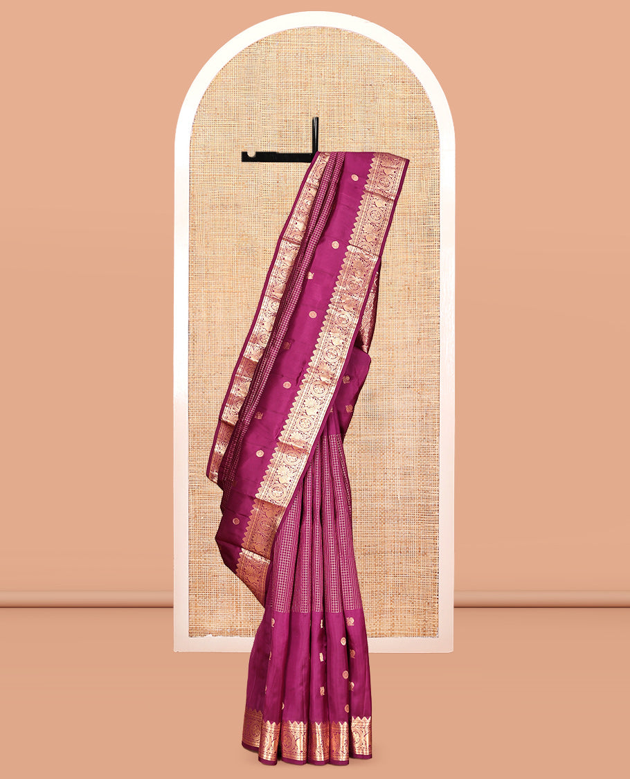 Purple Vasundhara Lite Silk Mix Saree, Artfully Detailed with Mayil-Chakram Buttas and Zari Checks All Over Its Body, Highlighted by a Zari Border of Thazampoo Rekkum, Paisa, Mayil, and Chakram Designs, a Grand Pallu, and Paired with a Matching Blouse