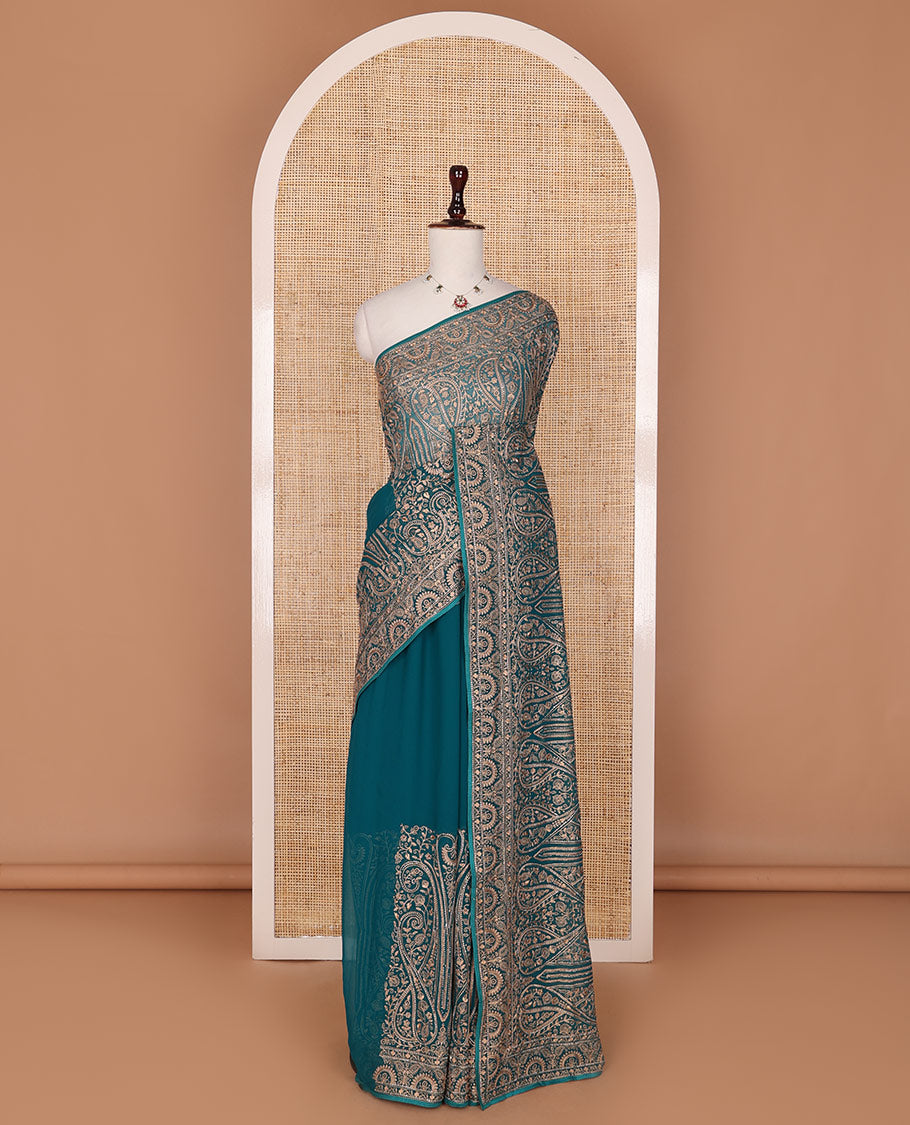Teal blue floral and paisley vine embroidered designer saree, scallop paisley thread embroidered border
