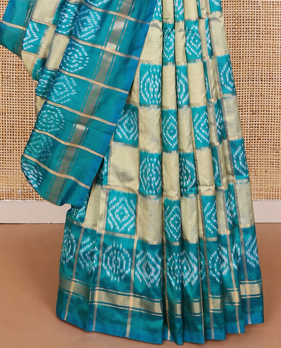 Blue buttas enclosed checked ikkat saree, self-border & pallu of buttas enclosed checks