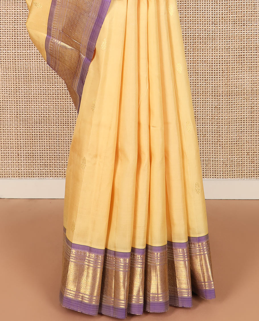 Sandal zari buttas Kanchipuram silk saree, contrast one-sided border of paneer sombu, banaras, muthu and then kuli kann designs, and pallu of zari designs