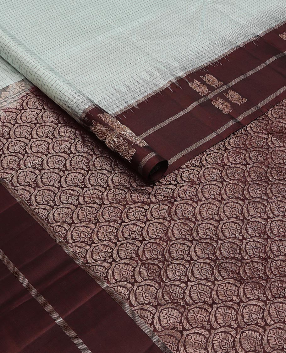 Blue checked silk saree, contrast border of mayil motifs & scallop design pallu