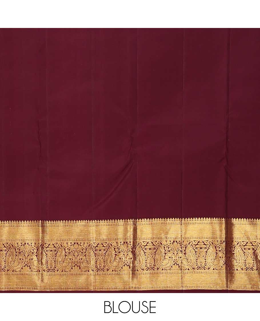 Orange zari buttas and checked Kanchipuram silk saree,contrast border of thilakam,banaras and mayil designs, and jaal pallu