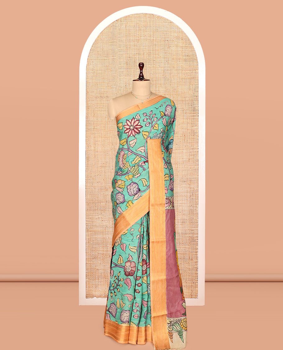 Green Kalamkari Silk Saree, Mesmerized with Human Figurines, a Contrast Traditional Zari Border, Kalamkari Pallu, and a Contrast Blouse