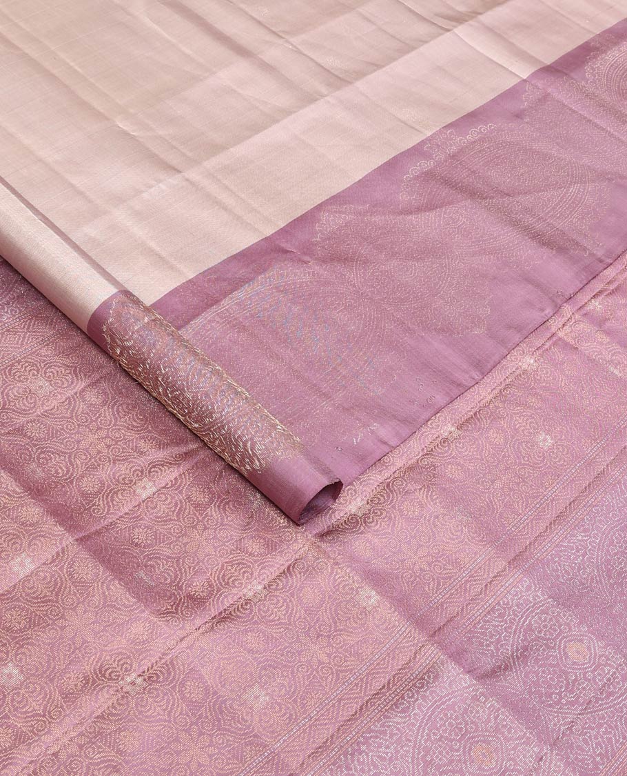 Grey buttas soft silk saree, contrast zari woven border, and pallu of intricate designs