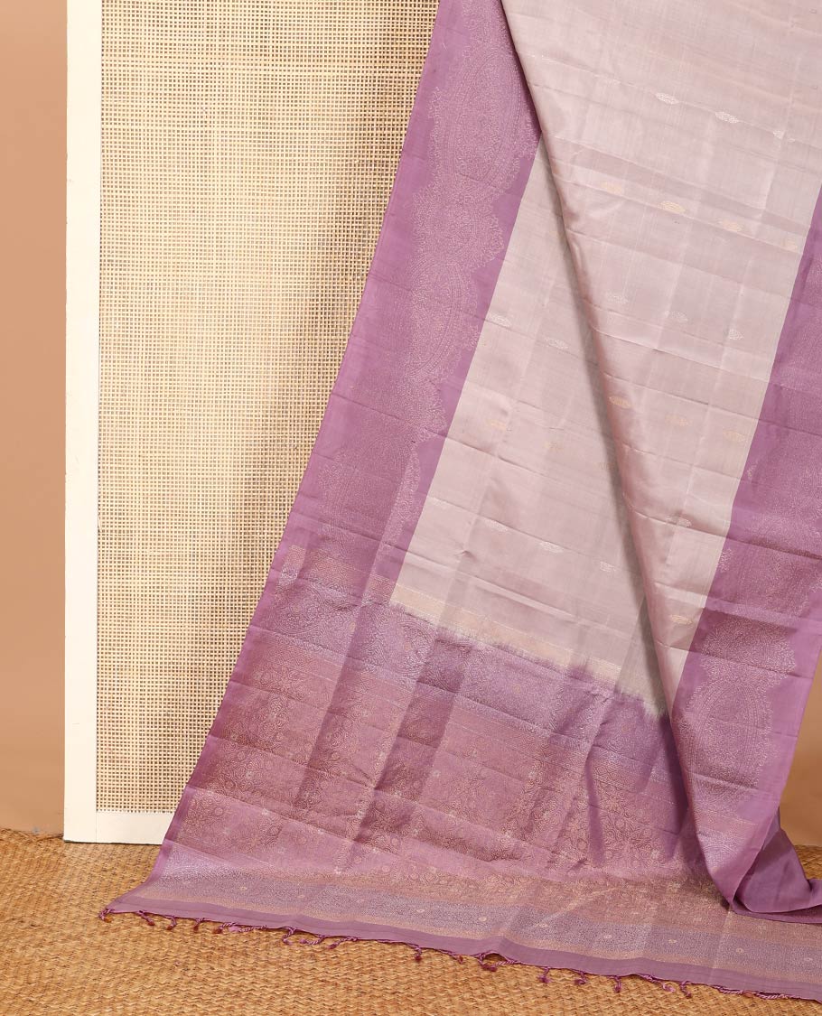 Grey buttas soft silk saree, contrast zari woven border, and pallu of intricate designs