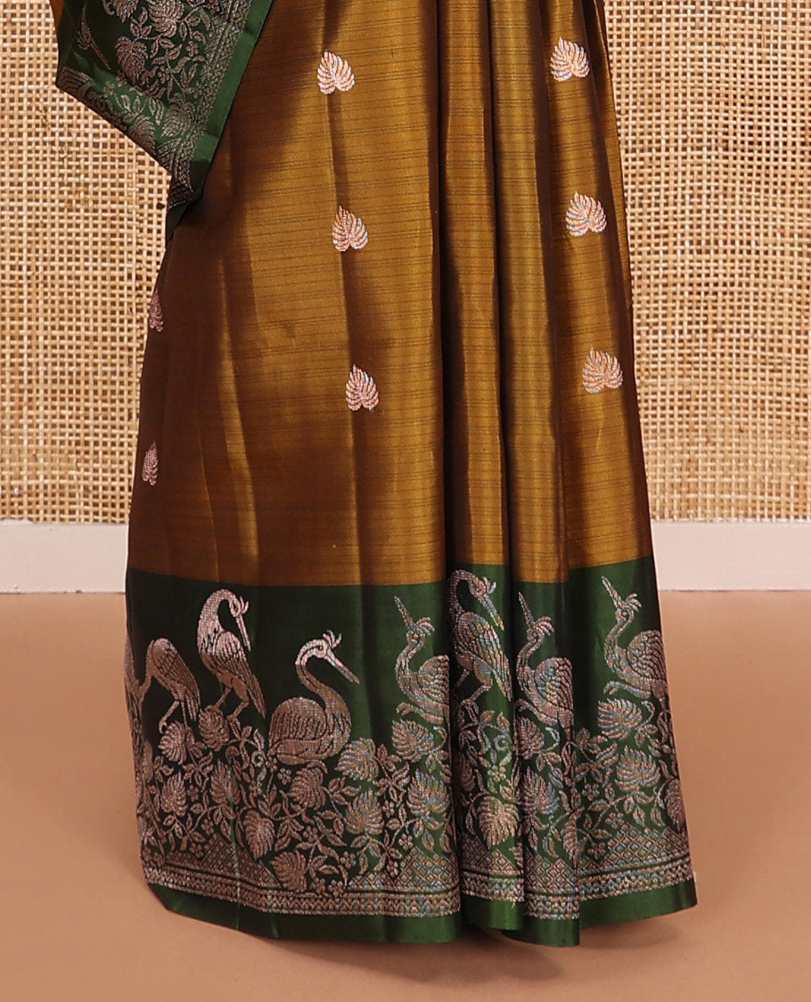 Green zari buttas soft silk saree, contrast floral and bird motifs border, and pallu of jaal, floral, and bird designs