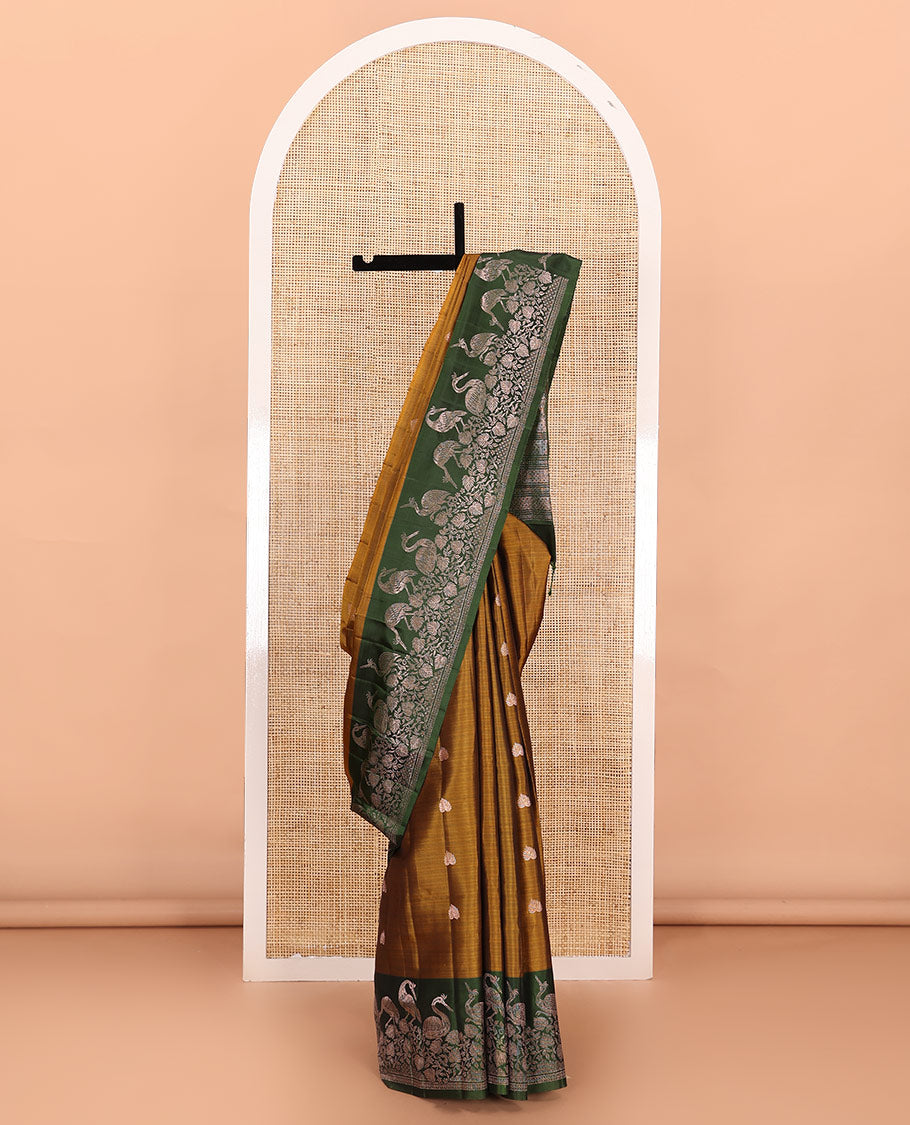 Green zari buttas soft silk saree, contrast floral and bird motifs border, and pallu of jaal, floral, and bird designs
