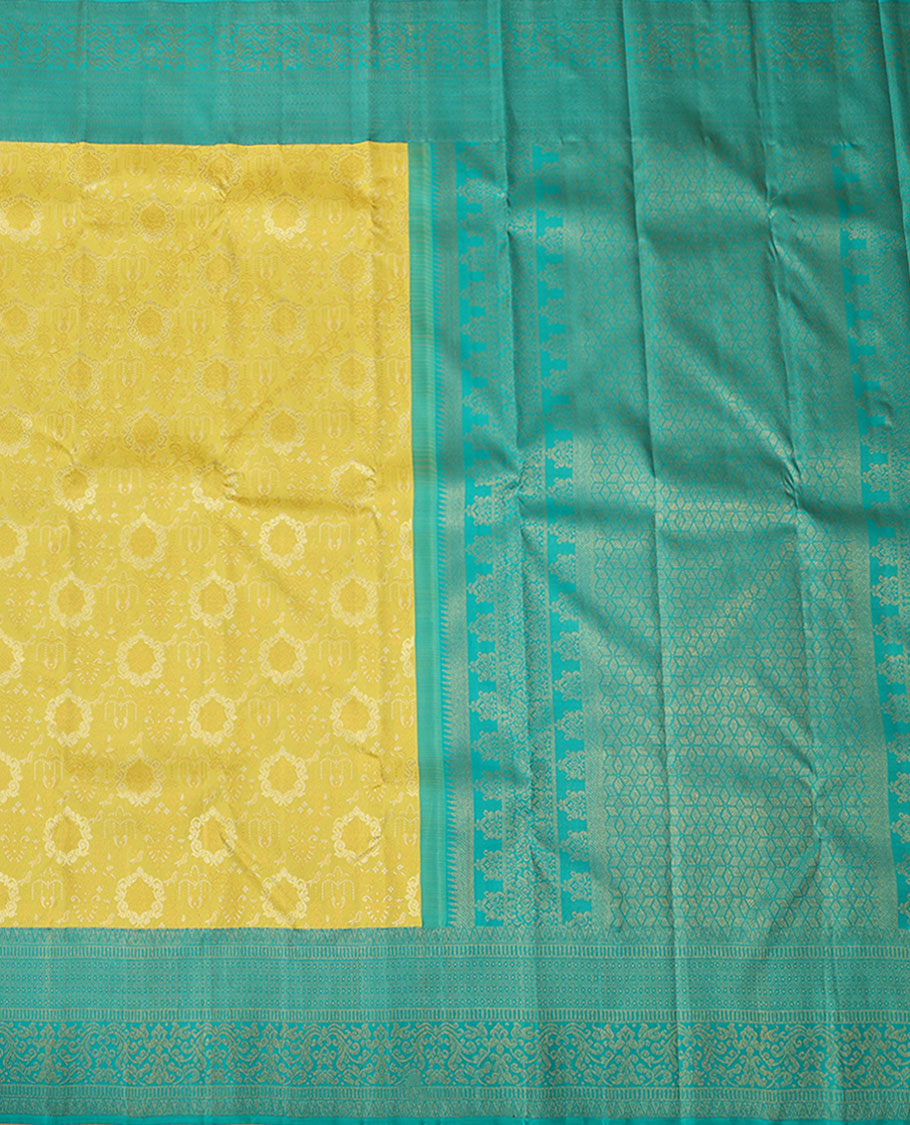 Yellow jacquard silk saree, contrast geometric patterned zari border & argyle patterned pallu