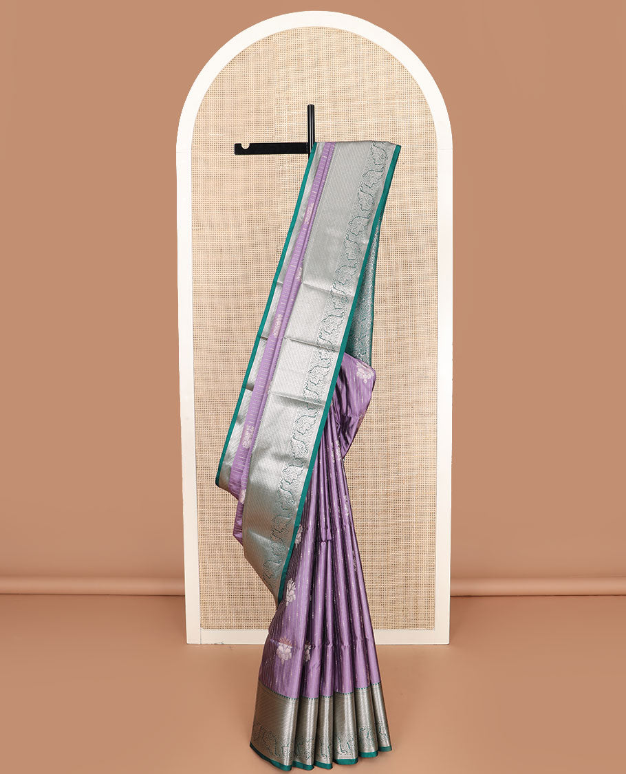 Purple striped and buttas soft silk saree, contrast traditional zari design border, and intricate floral design pallu