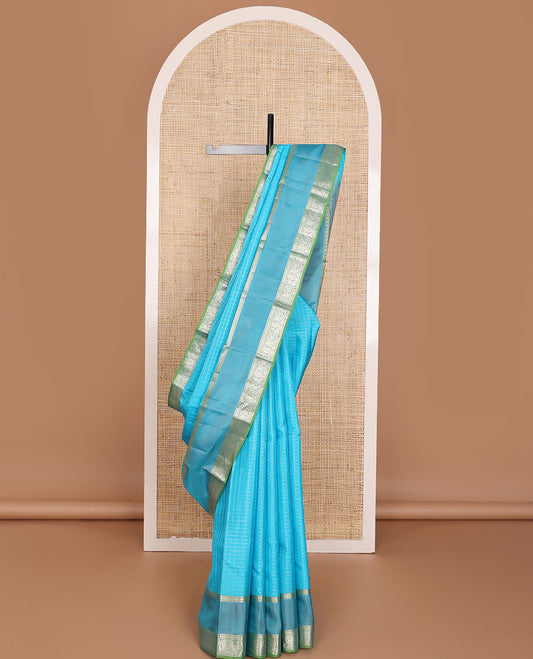 Blue zari checked Vasundhara elite silk saree, contrast jaal pallu & rettai pettu border of poun,muthu & mayil