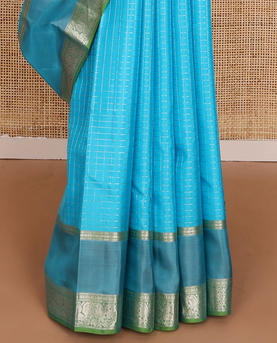 Blue zari checked Vasundhara elite silk saree, contrast jaal pallu & rettai pettu border of poun,muthu & mayil