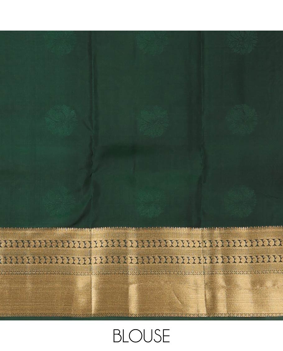 Magenta zari buttas Vasundhara silk mix saree, contrast border of thilakam, mayil kann, diamond, and manga designs, and geometric patterned pallu