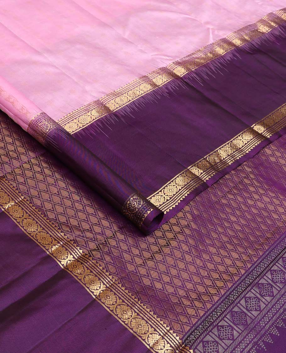 Pink buttas Kanchipuram silk saree, contrast border of rekku, banaras, muthu, and laddu kamalam, and jaal pallu