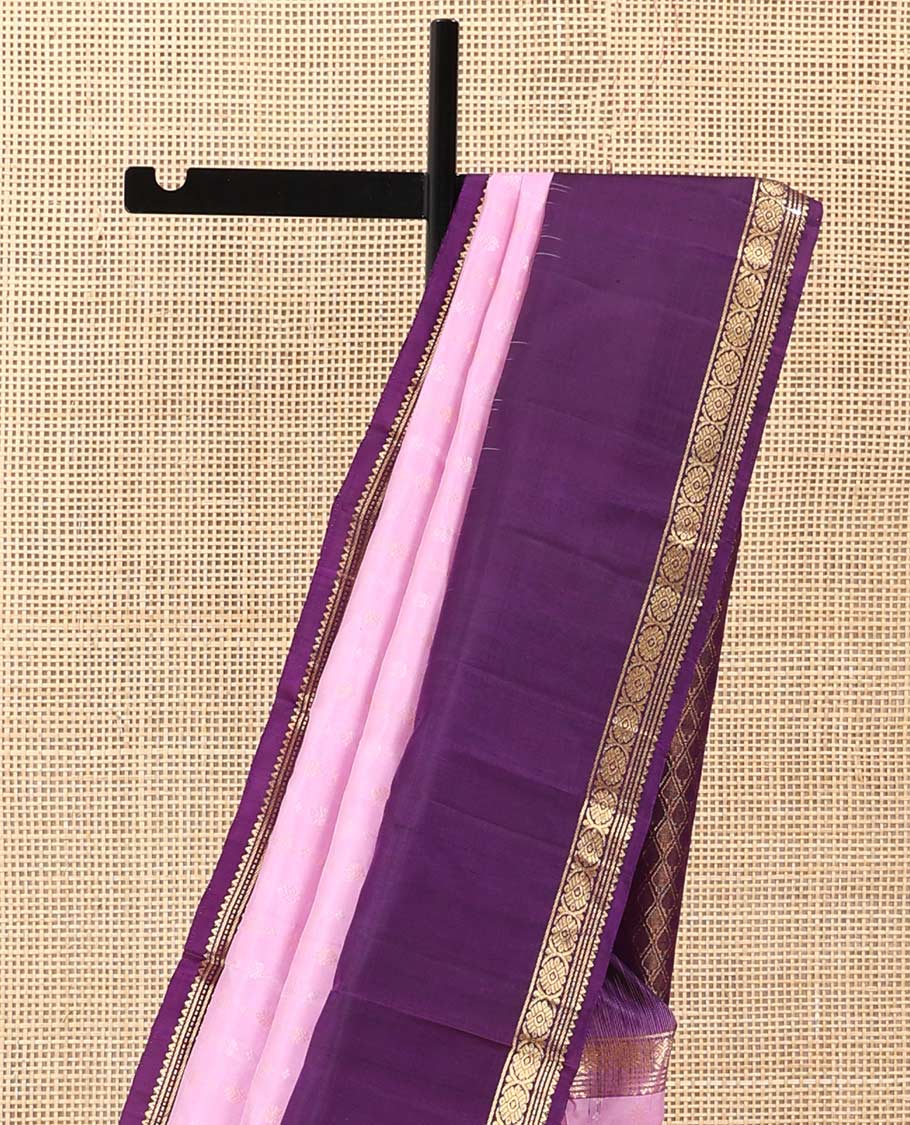 Pink buttas Kanchipuram silk saree, contrast border of rekku, banaras, muthu, and laddu kamalam, and jaal pallu