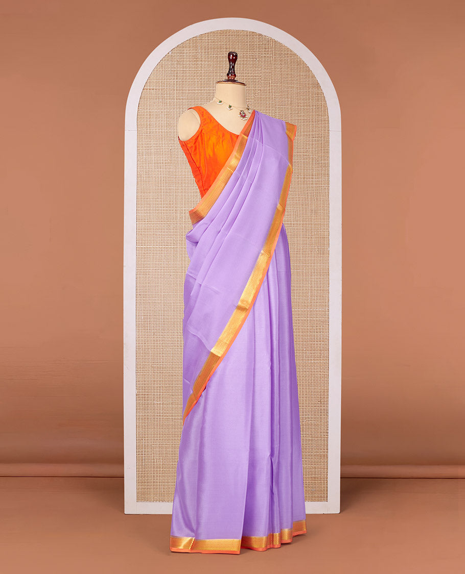 Lavender Plain Mysore Silk Saree, Complemented by a Contrast Traditional Zari Design Border, Zari Striped Pallu, and Paired with a Contrast Blouse