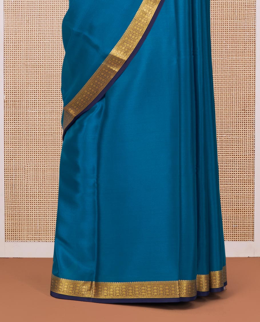 Peacock Blue Plain Mysore Silk Saree, Complemented by a Contrast Traditional Zari Design Border, Zari Striped Pallu, and Paired with a Contrast Blouse