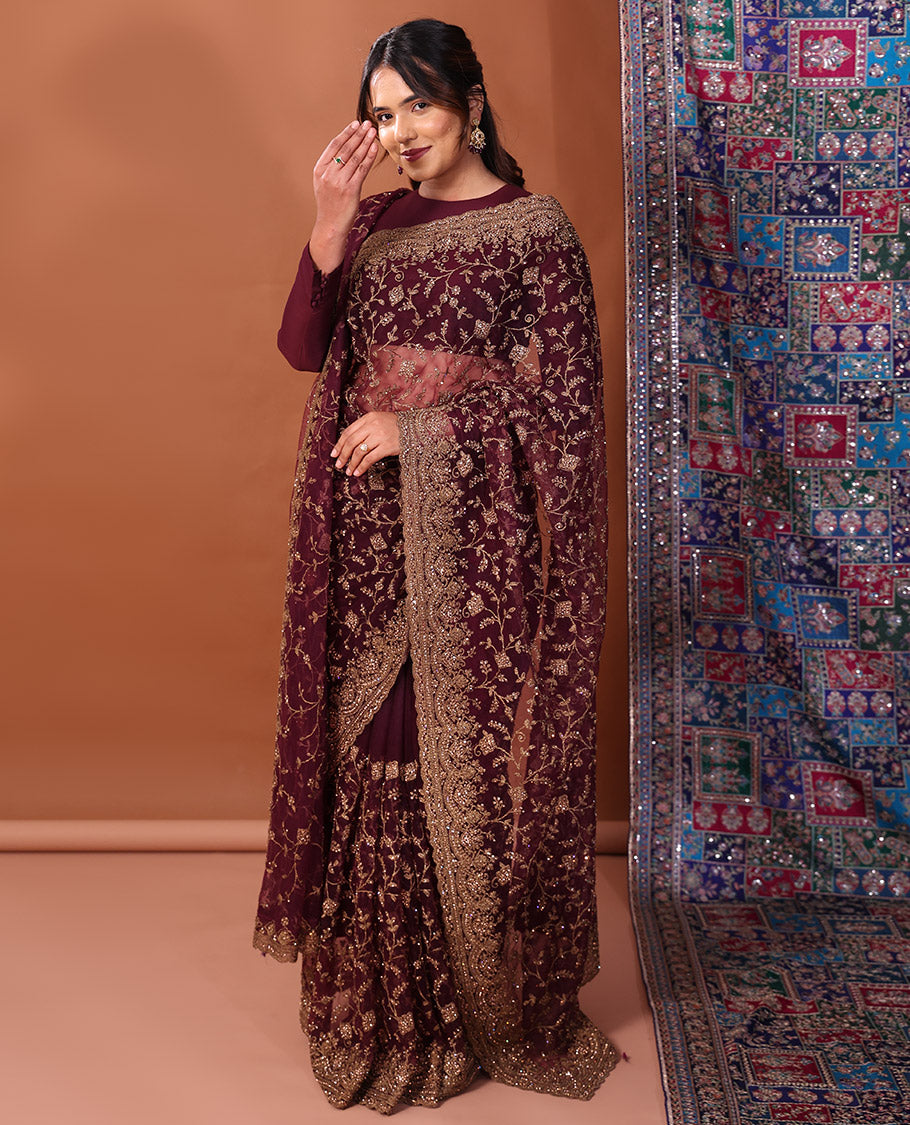 Wine Net Saree, Impeccably Embroidered with Floral Jaal Design All Over Its Body, Featuring a Scallop Embroidered Border, Floral Jaal Embroidered Pallu, and a Plain Blouse