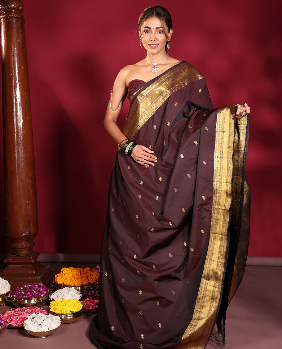 Brown Budget Silk Saree, Highlighted by Zari Buttas All Over Its Body, Spotlighted By Traditional Zari Designs Woven Border, Intricate Pallu, and Paired With a Matching Blouse