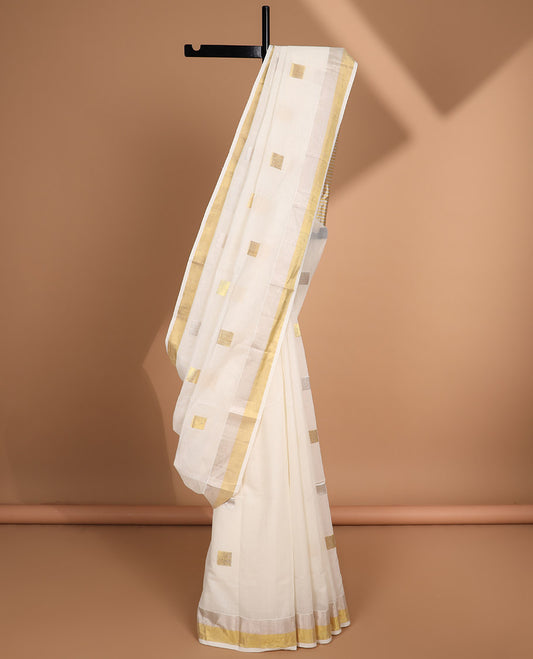 White geometric design kasavu saree with self gold zari border & gold striped pallu