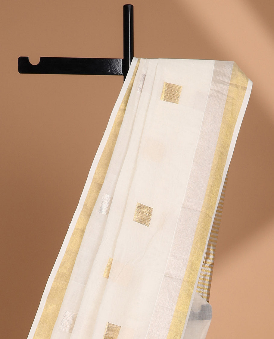 White geometric design kasavu saree with self gold zari border & gold striped pallu