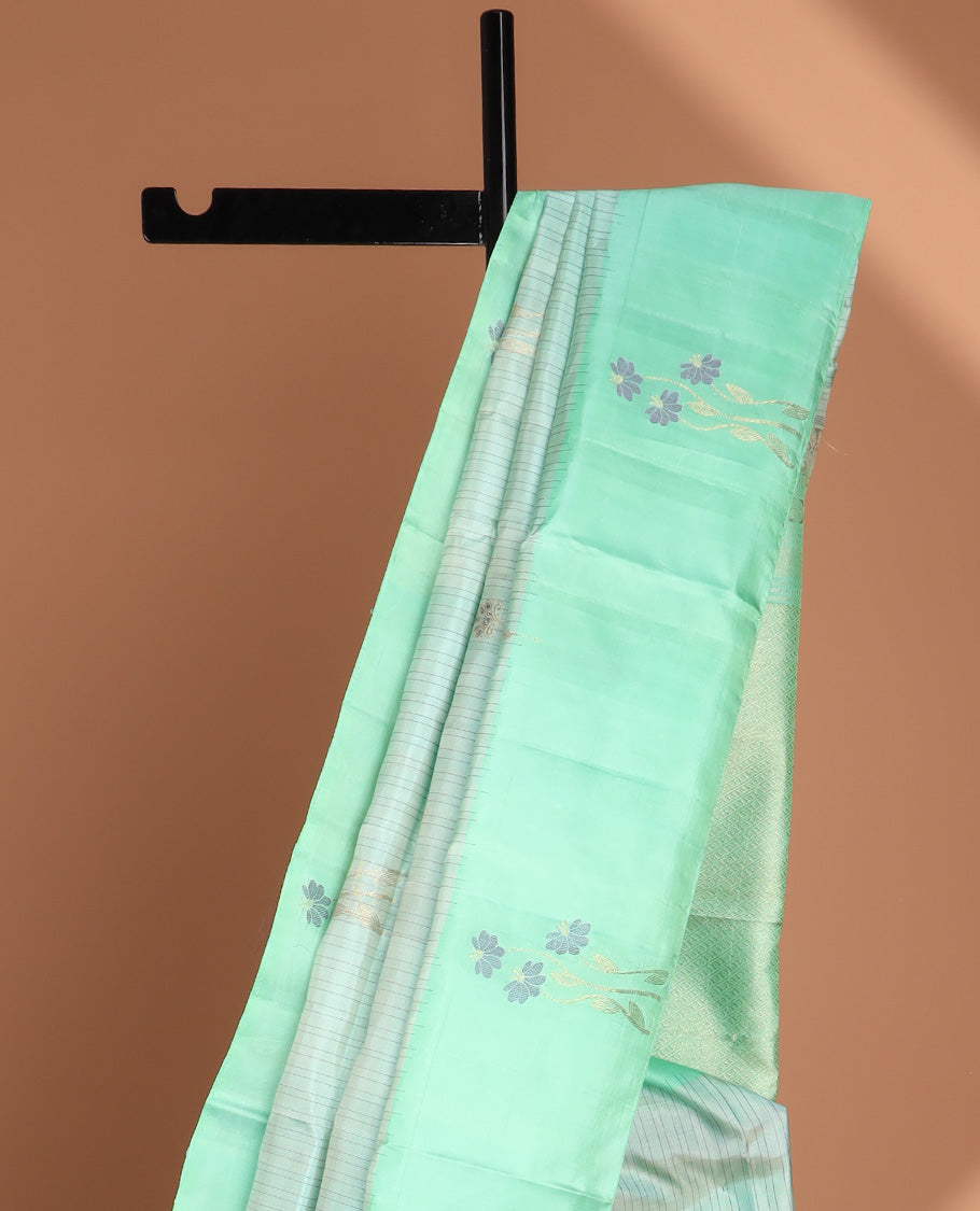 Blue striped soft silk saree with buttas, contrast floral design border & pallu of intricate designs