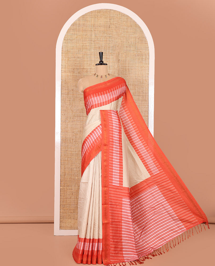 Chikku Manipuri Silk Saree Subtly Woven with Stripes All Over Its Body, Complemented by Contrast Geometric Print and Zari Work Border, Pallu Features Stripes, and Paired with a Contrast Striped Blouse