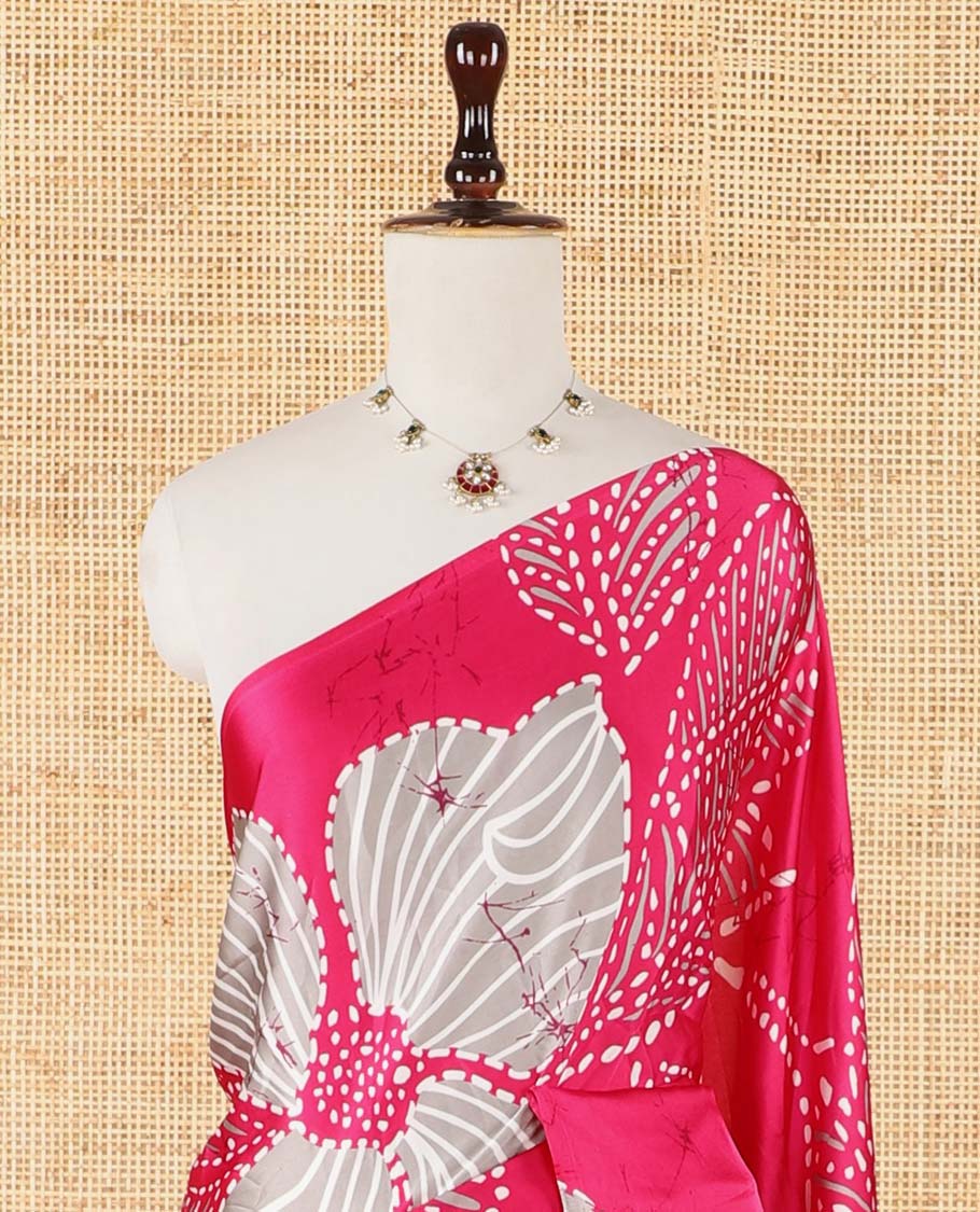 Borderless pink half-and-half model satin saree with batik-style big floral motifs digital printed body and pallu