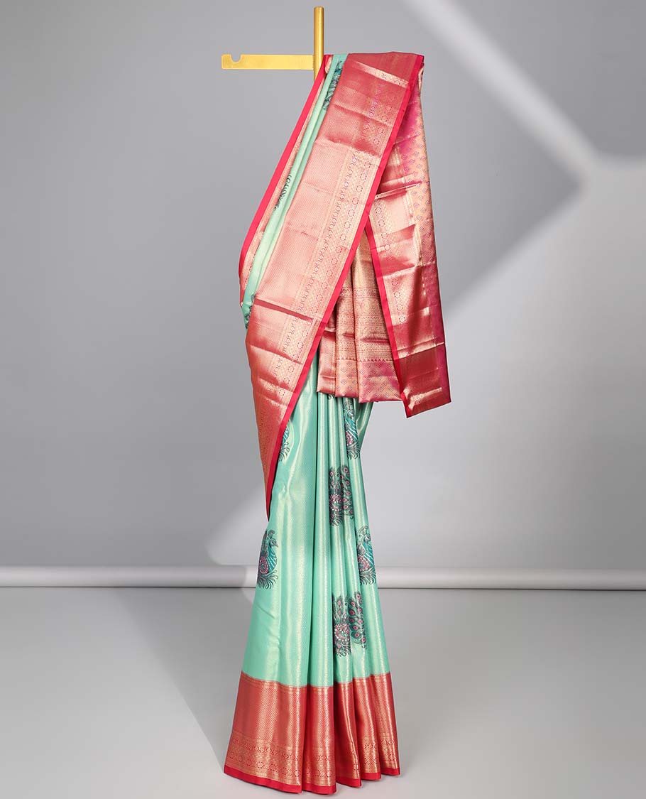 Green peacock buttas budget silk saree with contrast intricate zari design border & floral zari design pallu