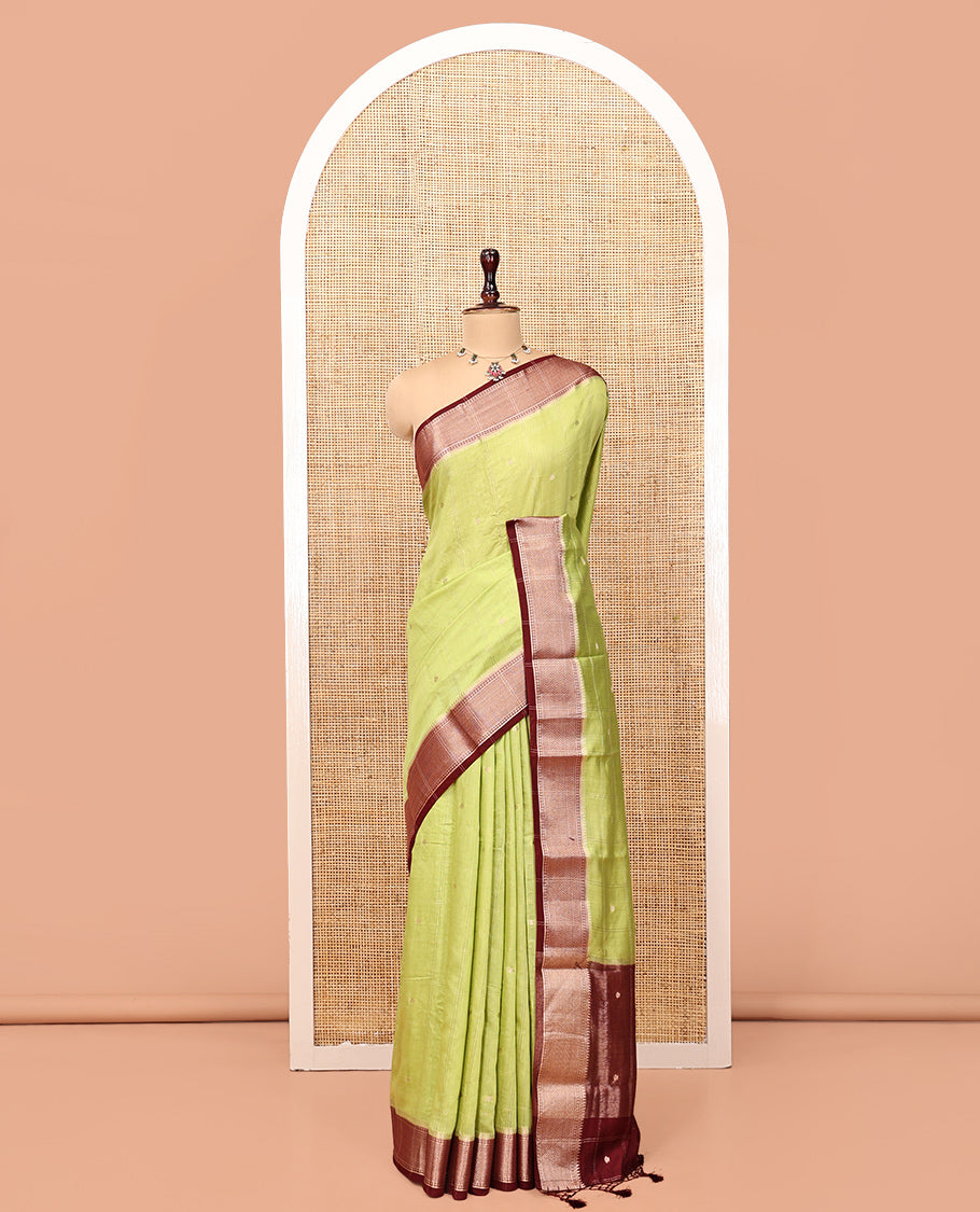 Green Assam Silk Saree, Adorned with Butta Enclosed Checks, Complemented by Contrast Traditional Zari Border, Gleaming Pallu, and Contrast Blouse