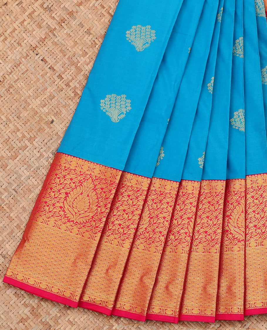 Blue Budget Silk Saree, Adorned with Zari Buttas on Its Body, Complemented by Contrast Border of Traditional Zari Designs, Pallu of Floral Designs, and Paired with a Contrast Blouse