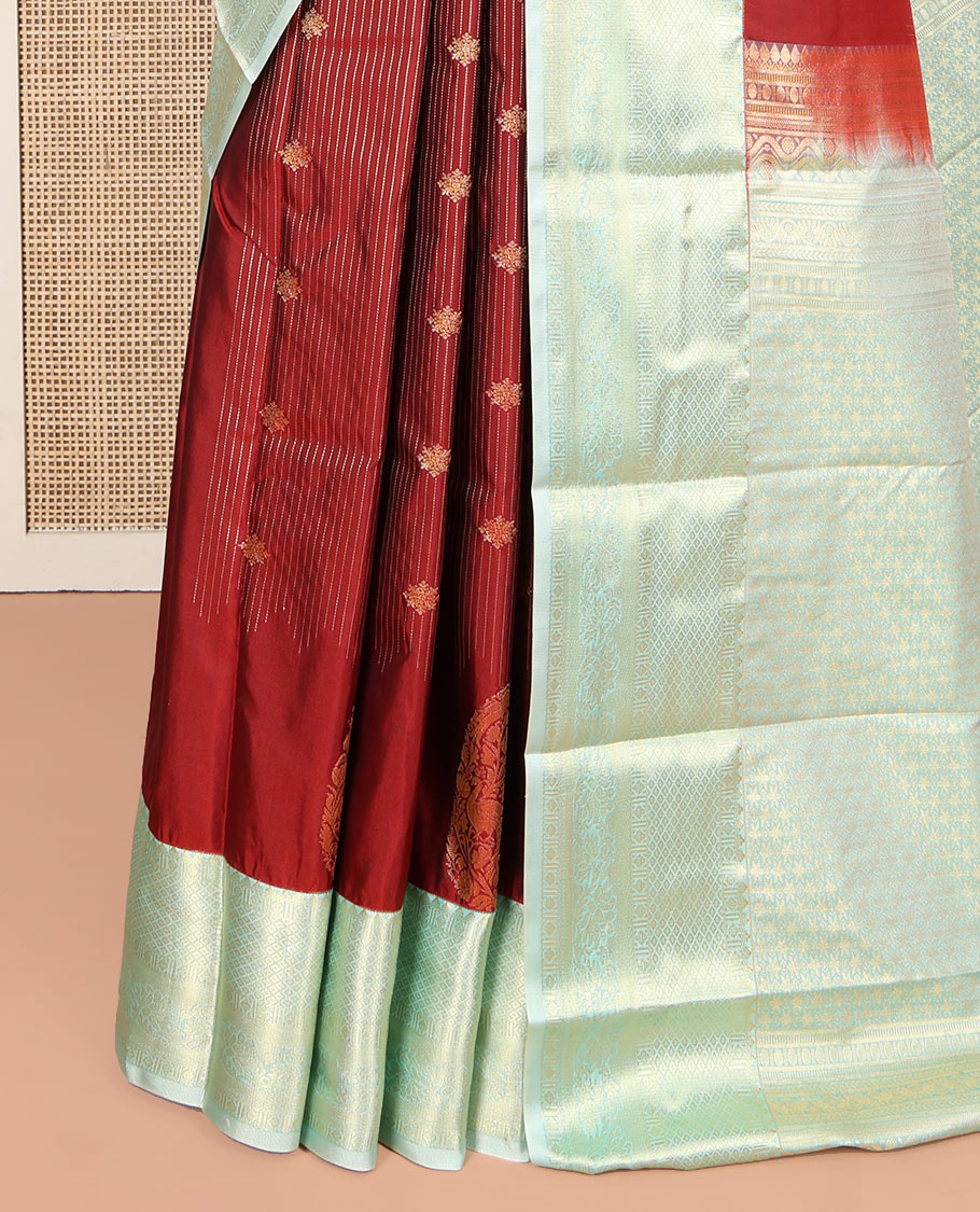 Red Budget Silk Saree, Mesmerized with Zari Buttas and Stripes All Over Its Body, Complemented by a Contrast Traditional Zari Design Border, Sparsely Woven Jaal Pallu, and Paired with a Contrast Blouse
