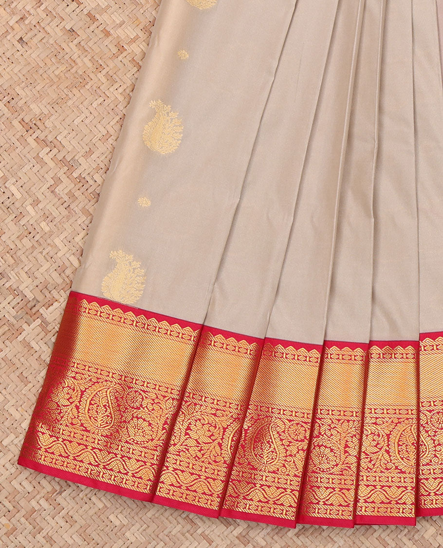 Grey Budget Silk Saree, Adorned with Zari Buttas All Across Its Body, Complemented by a Captivating Contrast Traditional Border of Floral-Paisley Designs, Pallu Steeped with Paisleys, and Paired with a Contrast Blouse