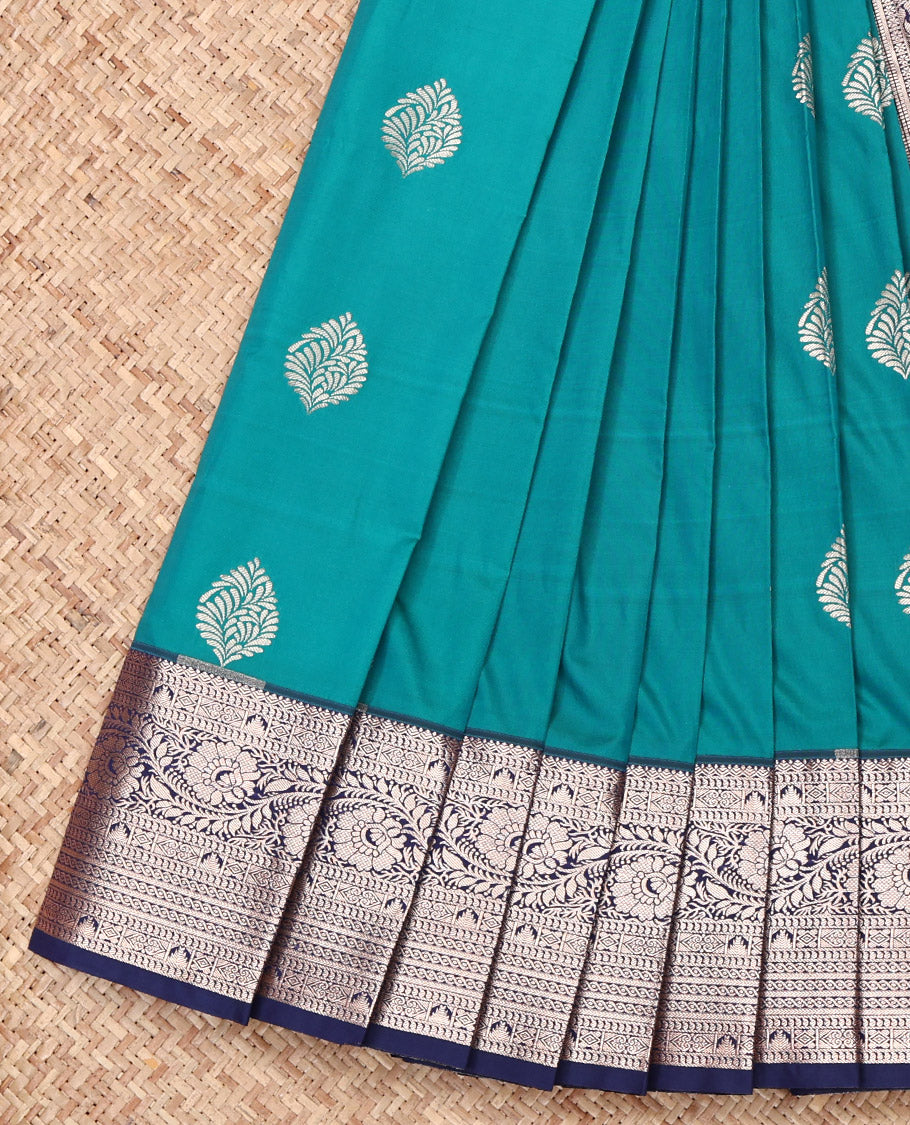 Blue Budget Silk Saree, Adorned with Zari Buttas All Over Its Body, Complemented by a Contrast Traditional Zari Design Woven Border, Mughal-Style Woven Pallu, and Paired with a Contrast Blouse