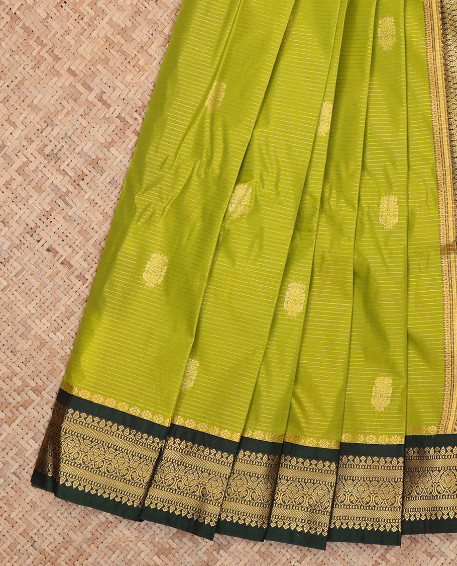 Green Budget Silk Saree, Adorned with Zari Buttas and Stripes, Complemented by Contrast Traditional Zari Border, a Grand Pallu and a Contrast Blouse
