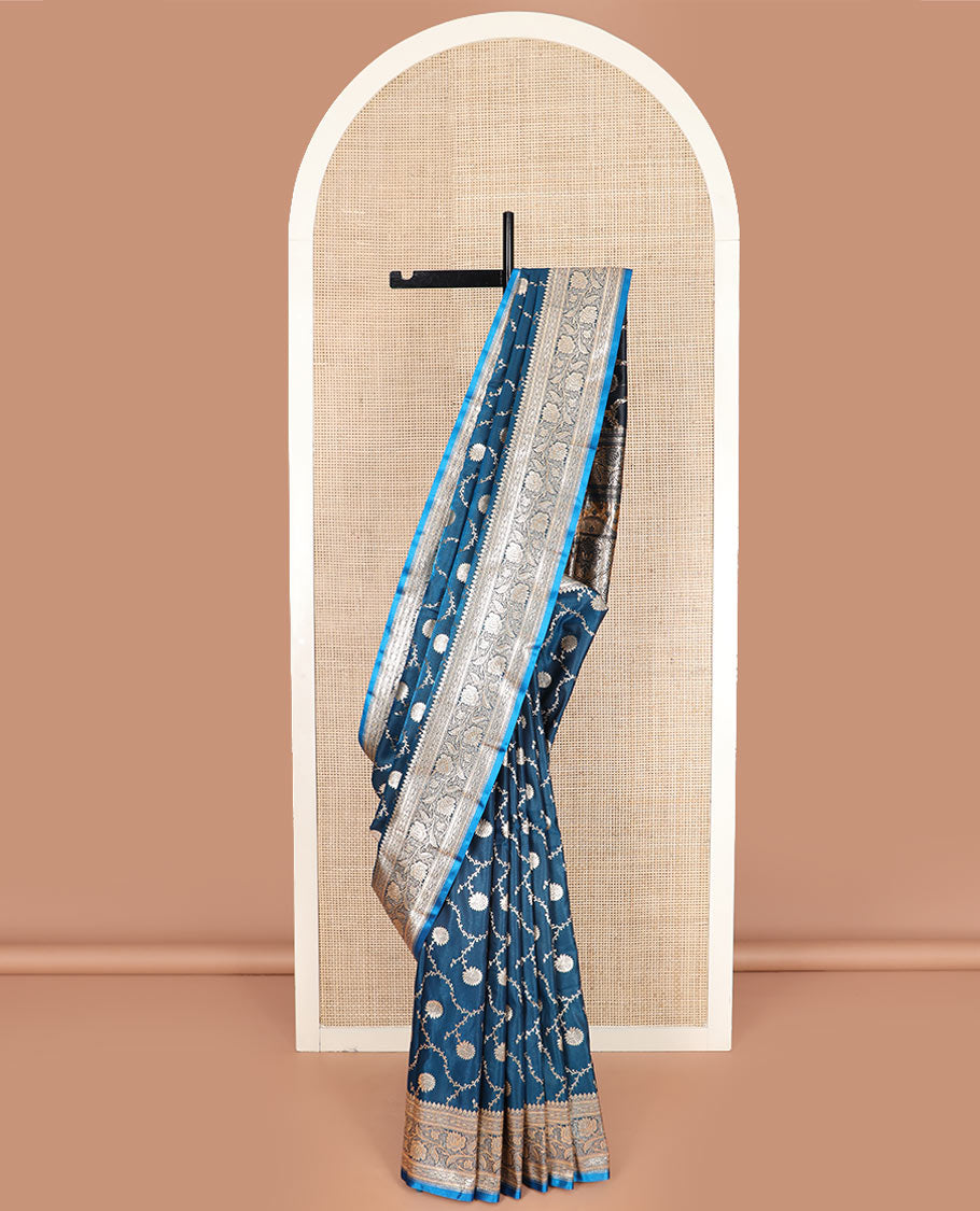 Blue floral jaal jacquard banarasi silk saree, floral creeper design border, and intricate ogee patterned pallu