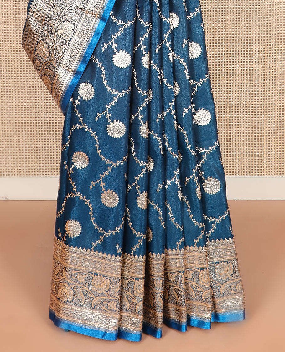 Blue floral jaal jacquard banarasi silk saree, floral creeper design border, and intricate ogee patterned pallu
