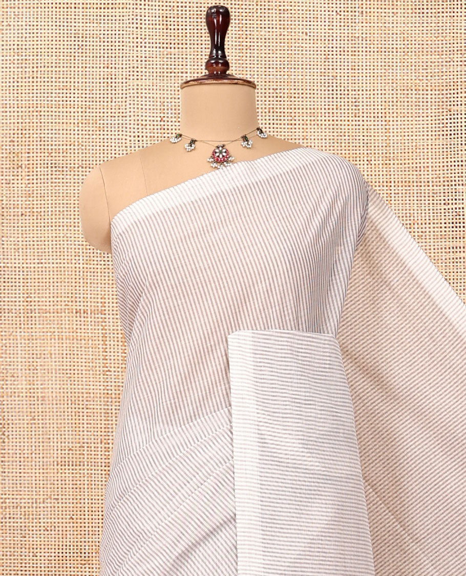 Borderless Off-White Jute Cotton Saree, Sparsely Woven with Stripes, a Self-Pallu Depicts Peacock Designs, and a Matching Blouse