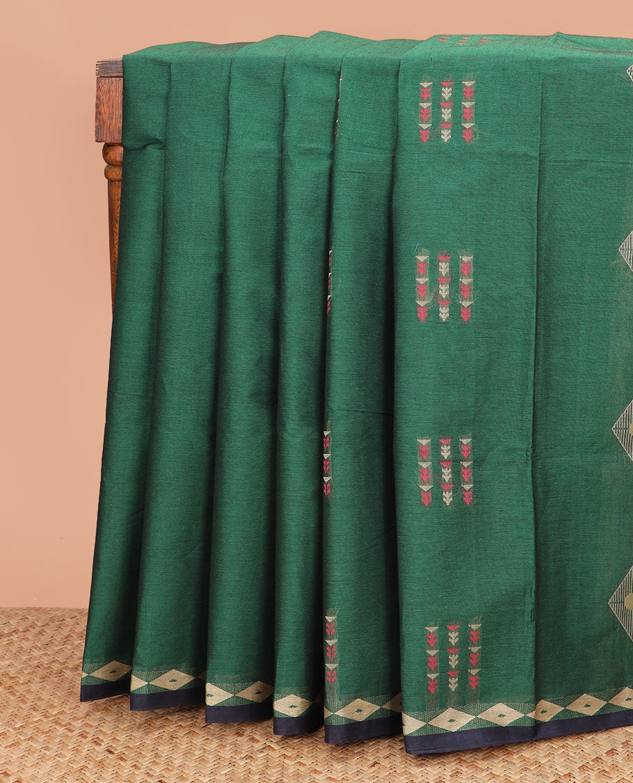 Green floral thread motifs coimbatore cotton saree, diamond patterned border, and pallu of geometric patterns