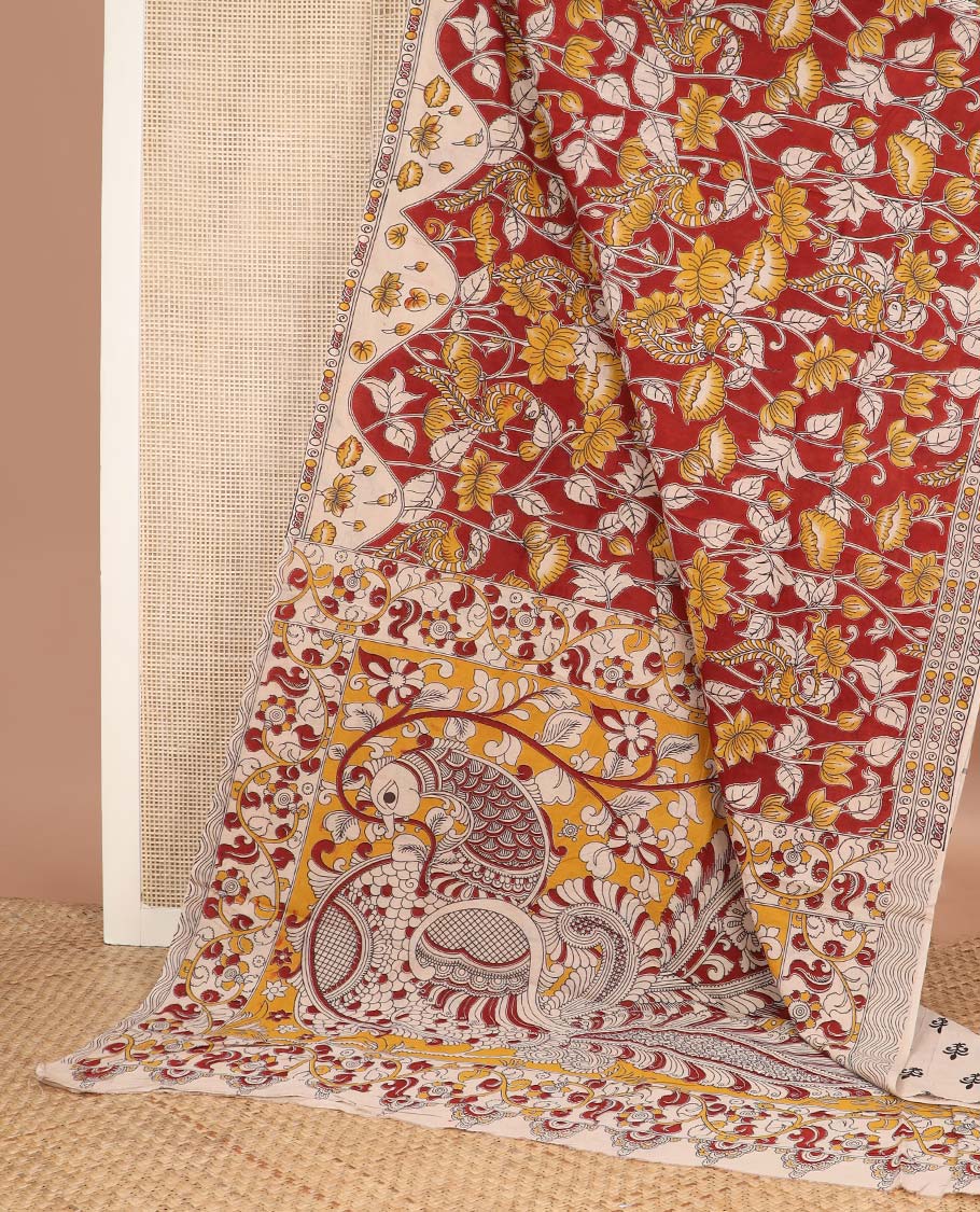 Red floral-peacock machine printed kalamkari cotton saree, contrast lotus printed border, and pallu of floral-peacock print