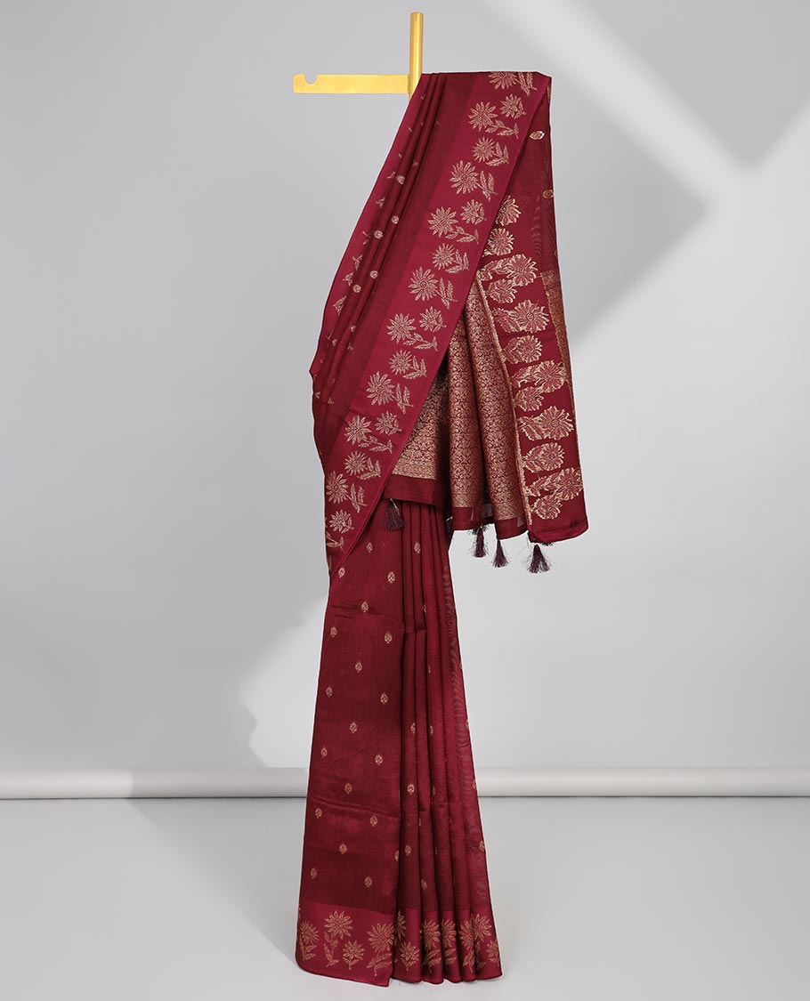 Maroon floral buttas dola silk saree with self floral design border & intricate zari design pallu