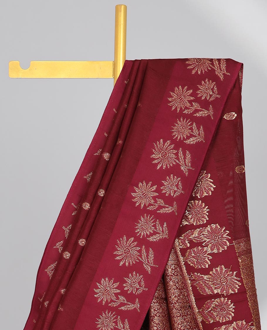Maroon floral buttas dola silk saree with self floral design border & intricate zari design pallu