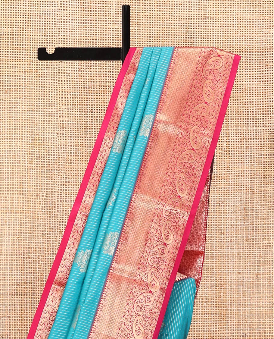 Peacock Green and Rani Pink Budget Silk Saree, Embellished with Vaira Oosi Stripes and Zari Buttas All Over Its Body, Complemented by Contrast Traditional Zari Designs Woven Border of Paisleys, Grand Pallu and Paired with a Contrast Blouse