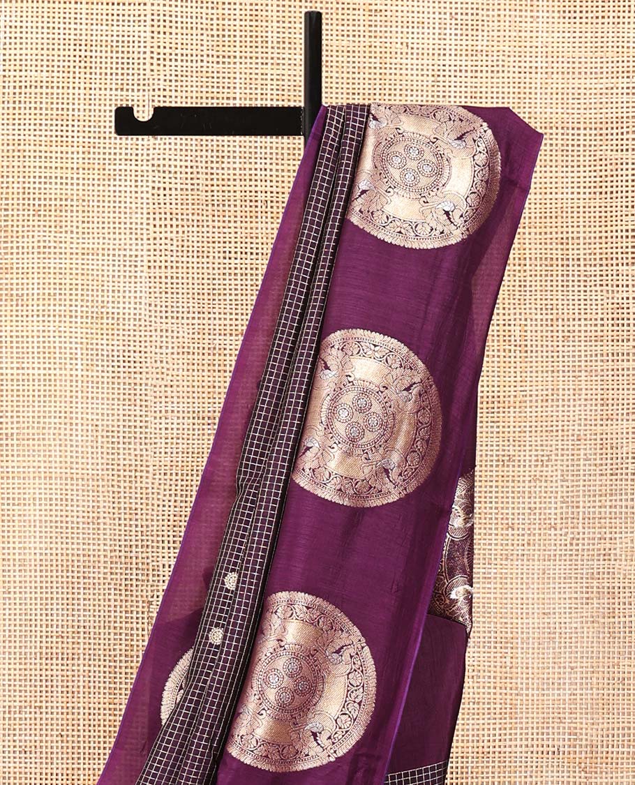 Dark Purple H O-Silk Saree, Beautifully Decked up with Zari Buttas and Zari Checks On Its Body, Accentuated with Contrast Big Chakram Motifs Woven Border, Grand Jaal Design Woven Pallu, and Paired with a Checked Blouse