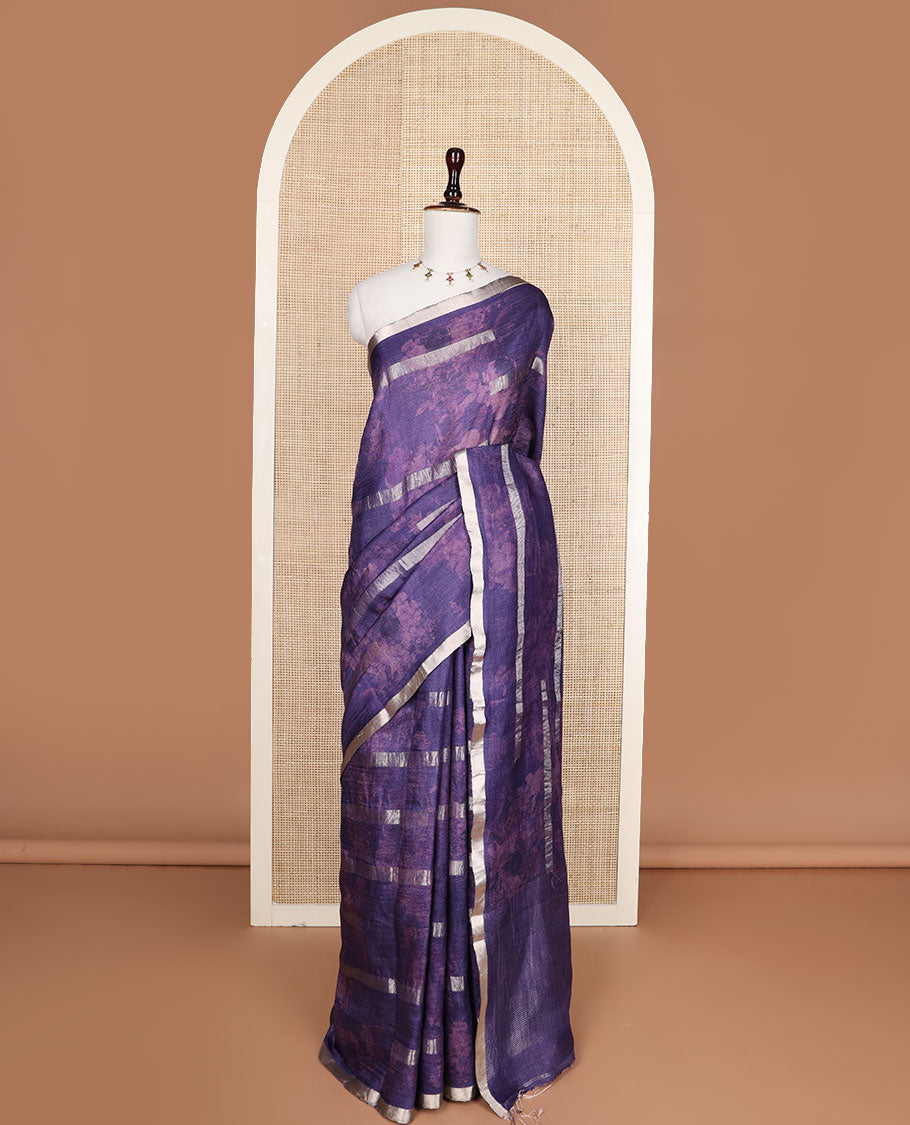 Blue silhouette style floral printed with silver zari striped tussar saree, piping zari border, and zari rich pallu