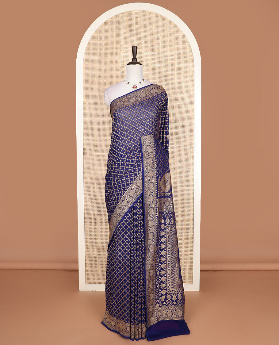 Blue jaal jacquard banarasi silk saree, floral creeper zari border, and pallu of Mughal-style intricate designs