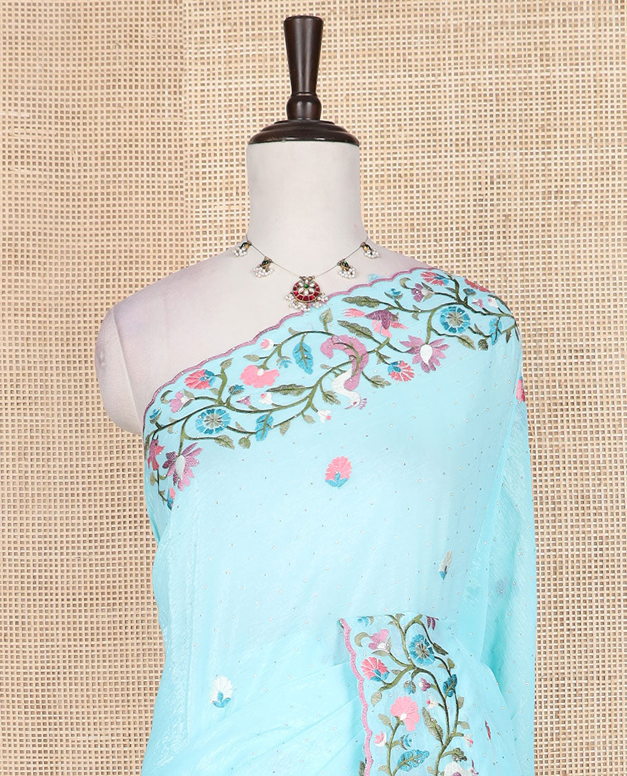 Blue floral motifs embroidered with stone work designer saree, scallop floral vine and bird embroidered border