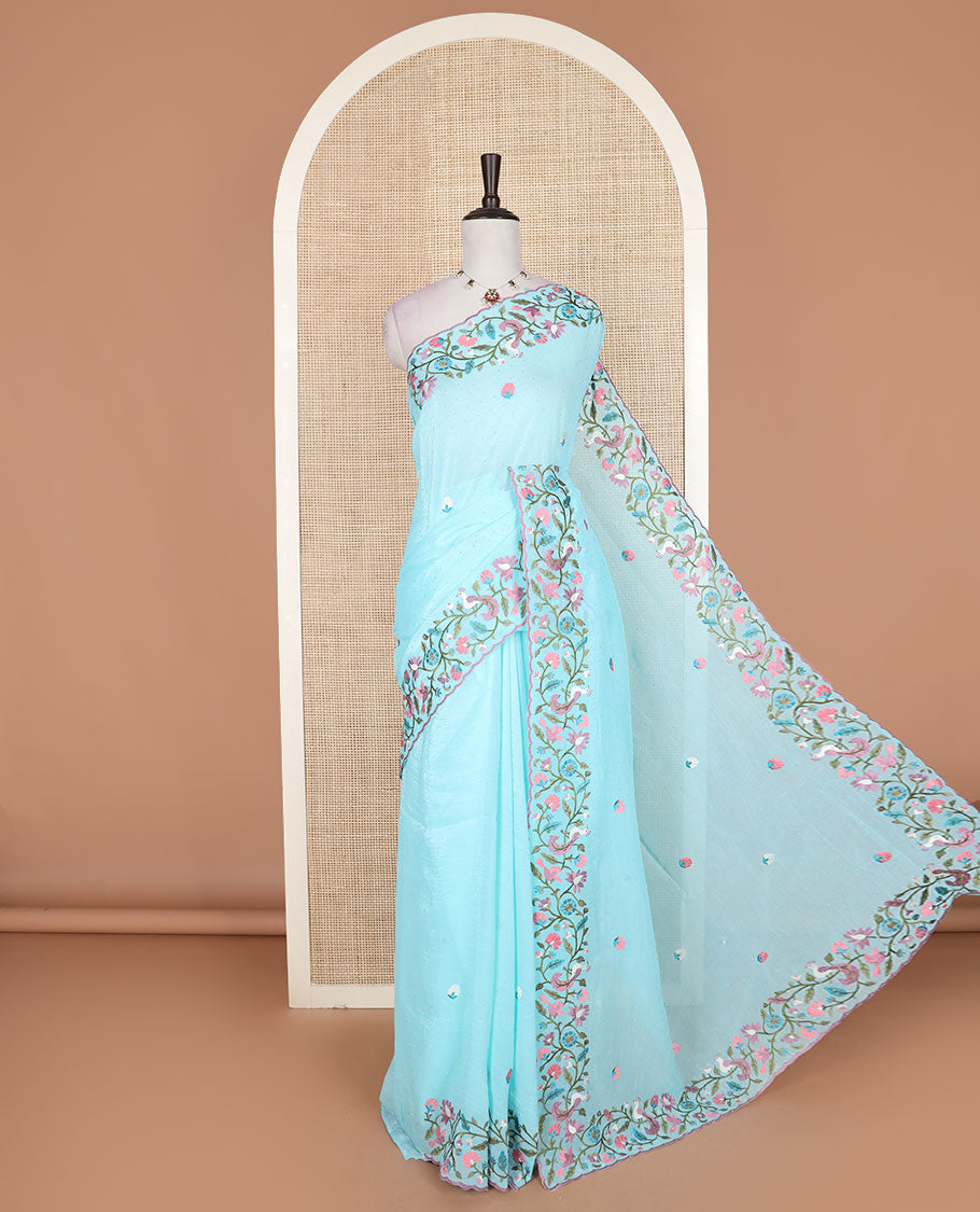 Blue floral motifs embroidered with stone work designer saree, scallop floral vine and bird embroidered border
